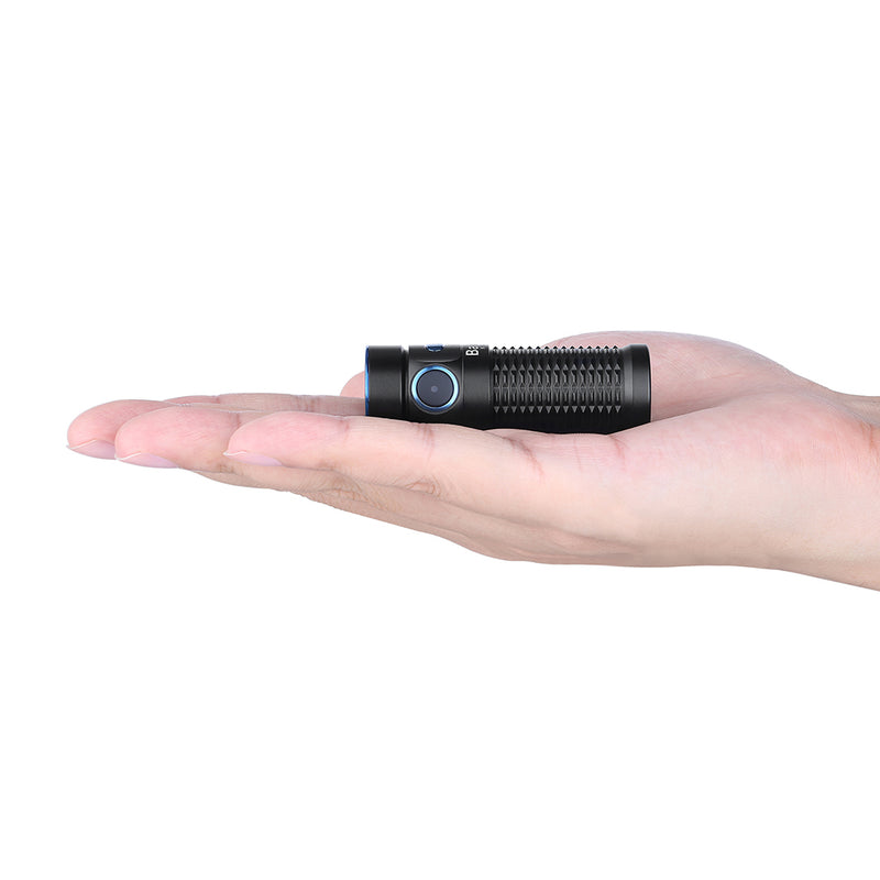Olight Baton 3 Rechargeable 1200 Lumens Torch in palm of hand