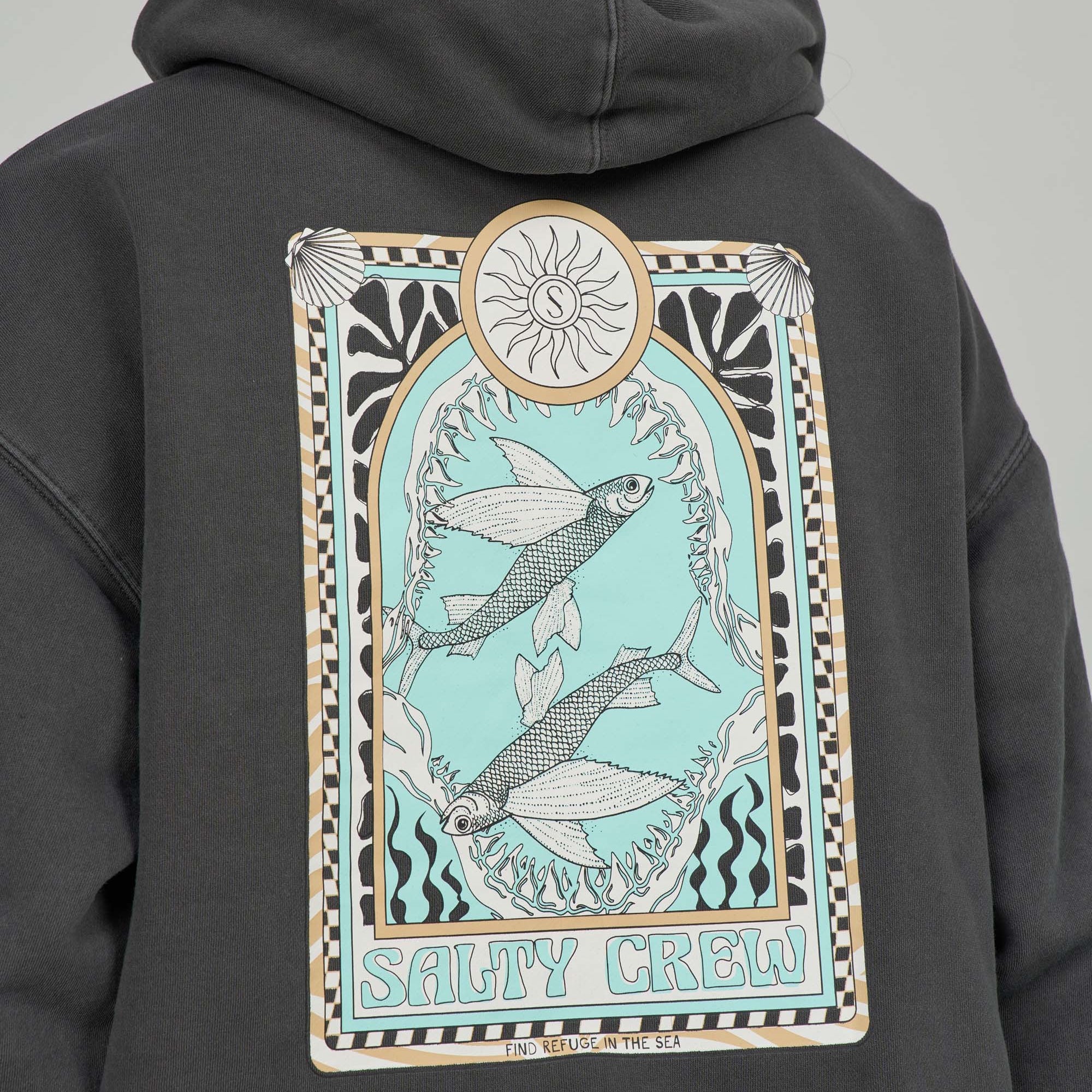 Close up of fish graphic on Salty Crew hoodie