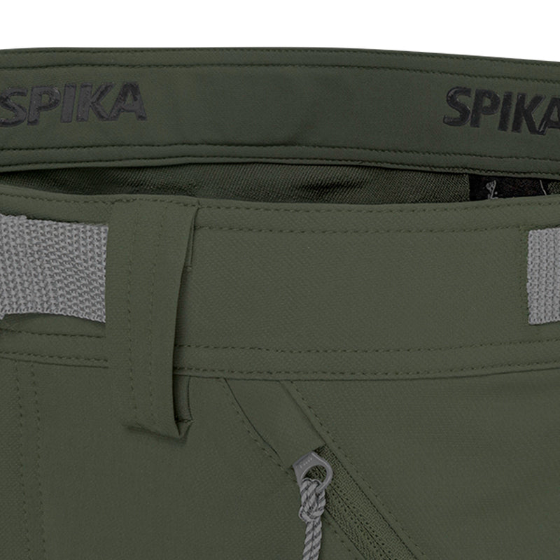 Close-up of green tactical pants with 'SPIKA' branding