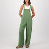 Model wearing Swanndri Women's Julia Linen Dungarees in Clover