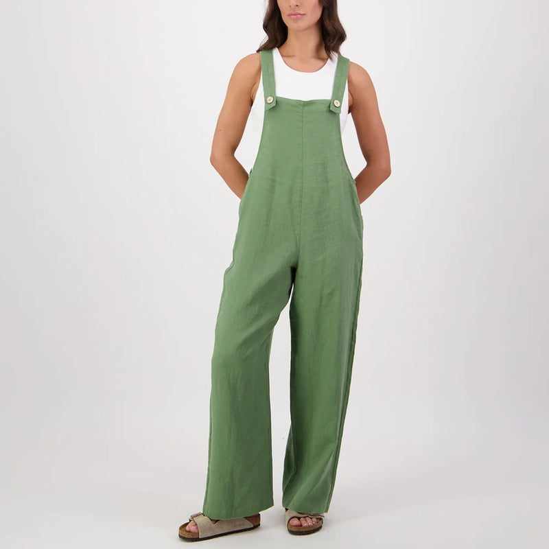 Model wearing Swanndri Women's Julia Linen Dungarees in Clover