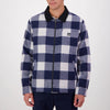 Person wearing a blue and white checkered Swanndri Liverpool jacket 
