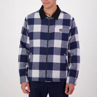 Person wearing a blue and white checkered Swanndri Liverpool jacket 
