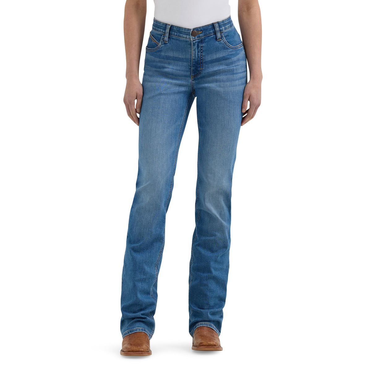 Front of model wearing Wrangler willow riding jeans with a white tee