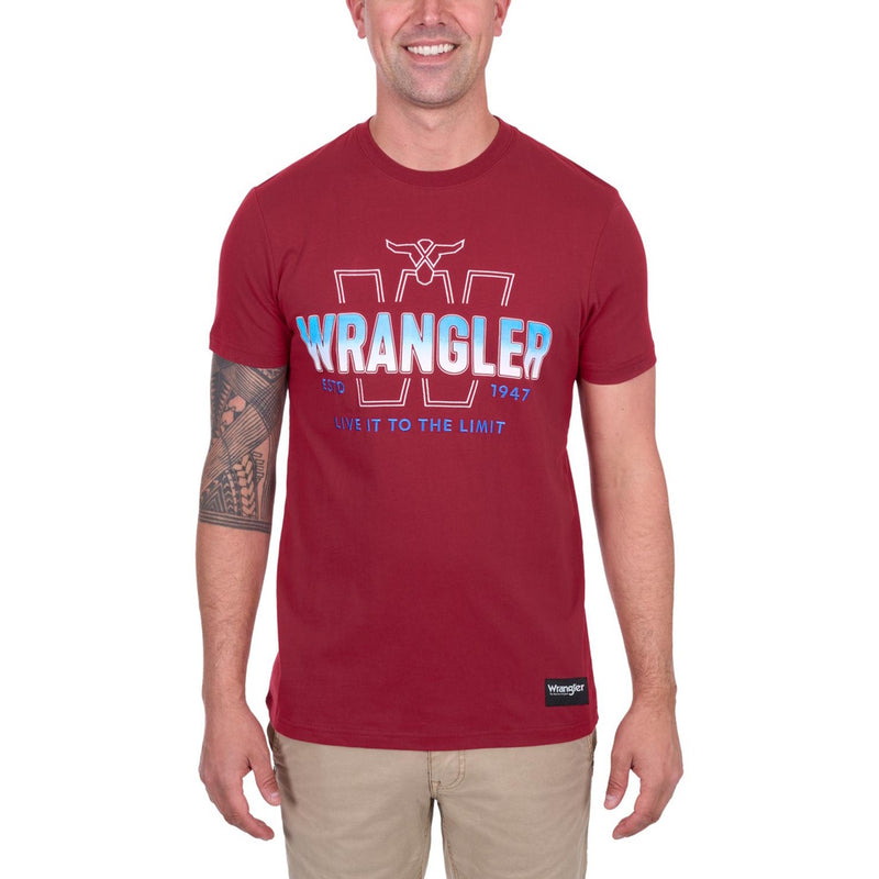 Man wearing a red Wrangler t-shirt with logo and text