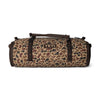 Camouflage-patterned duffel bag with YETI logo on a white background