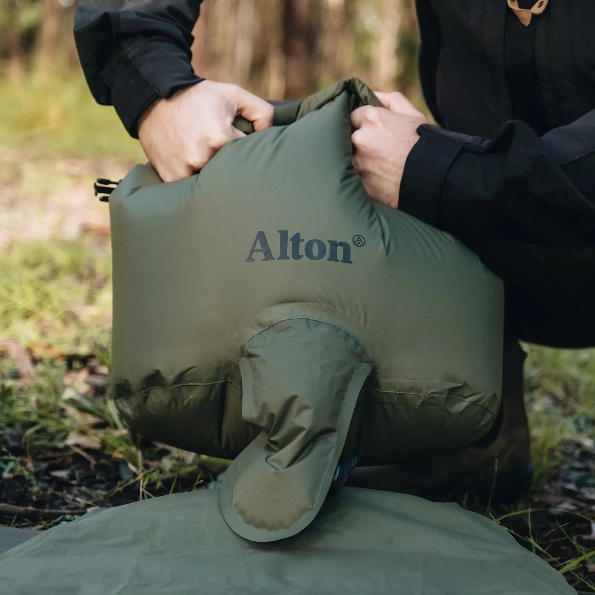 Front view of Alton Goods Ultralight Pump Bag being used to inflate mattress