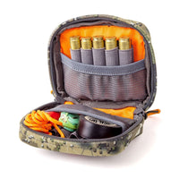 Inside of Hunters Element Velocity Ammo Pouch with ammo, tape, cord inside