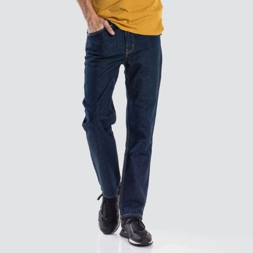 Front view of male model wearing Levi's 516 Men's Straight Fit Jeans in Rinse