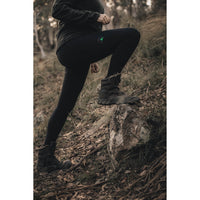 Woman standing on rock in Ridgeline Womens Infinity Leggings