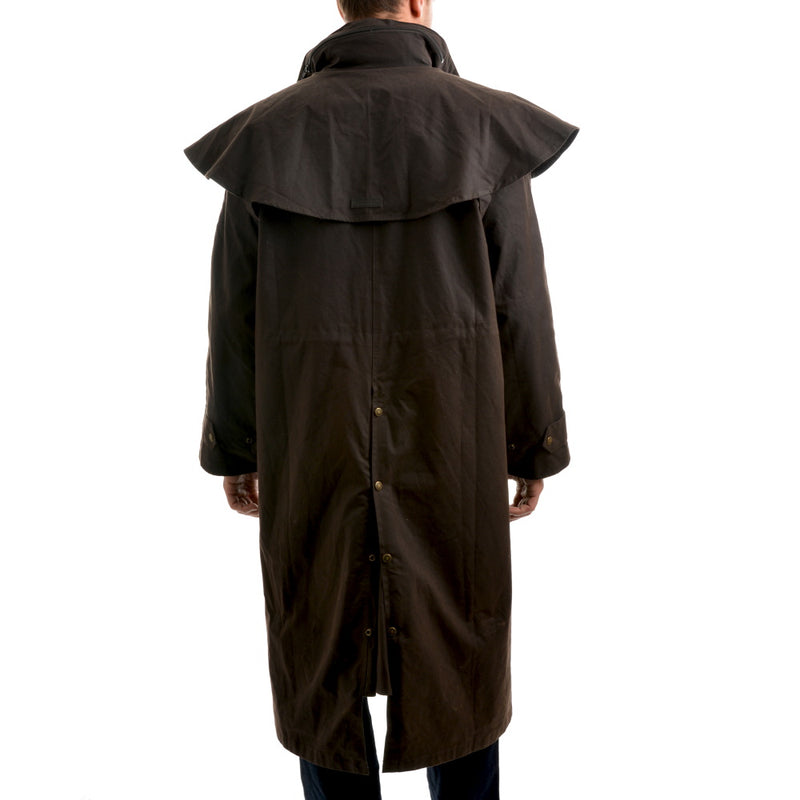 Back view of model wearing Thomas Cook High Country Professional Oilskin Long Coat in Brown