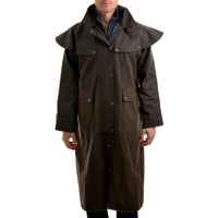 Front view of model wearing Thomas Cook High Country Professional Oilskin Long Coat in Brown