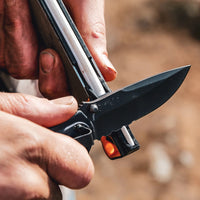 Serrared blade being sharpened with Work Sharp Guided Field Sharpener