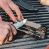 Knife being sharpened with Work Sharp Guided Sharpening System